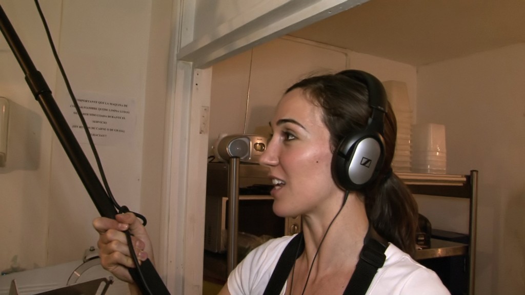 Argentinian collaborator/sound recordist Maria helps explain the dish chef Adrian is making—milanesa de pollo (chicken escalope). Maria adds that she has seen something similar in the supermarket in London labeled  milanese.